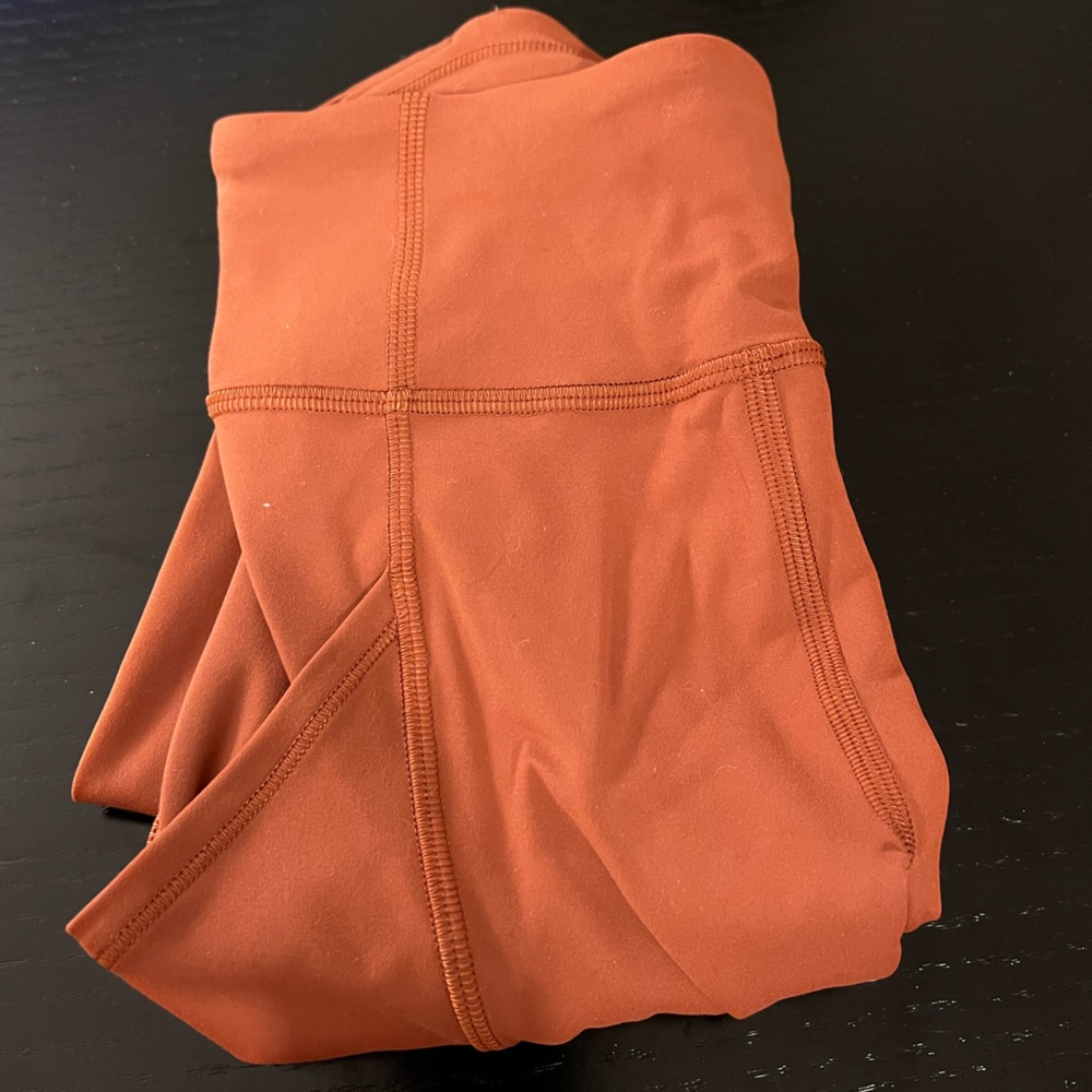 Lululemon Invigorate High-Rise Tight 25” in Dark Terracotta